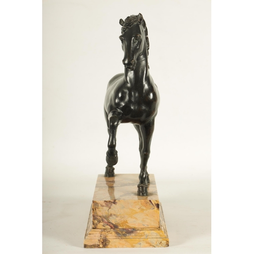 699 - AN 18TH/19TH CENTURY ITALIAN BRONZE SCULPTURE of a prancing horse, mounted on a veined marble moulde... 