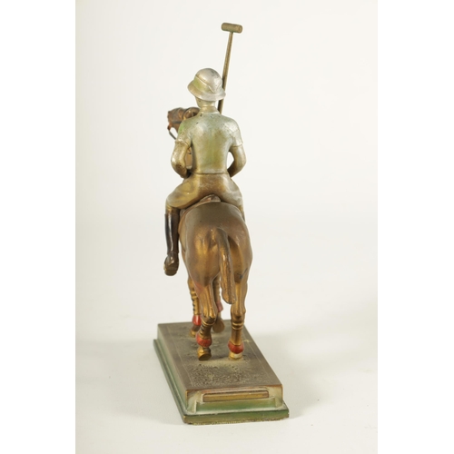 700 - AN ART DECO AUSTRIAN COLD PAINTED METAL TABLE LIGHTER formed as a polo player on horseback, possibly... 