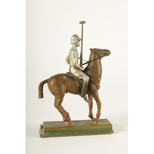 700 - AN ART DECO AUSTRIAN COLD PAINTED METAL TABLE LIGHTER formed as a polo player on horseback, possibly... 