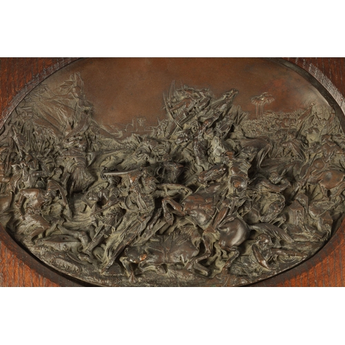 701 - AFTER JUSTIN MATHIEU. A 19TH CENTURY BRONZE OVAL PLAQUE MODELLED IN HIGH RELIEF DEPICTING A MEDIEVAL... 