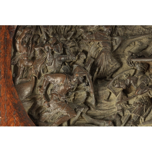 701 - AFTER JUSTIN MATHIEU. A 19TH CENTURY BRONZE OVAL PLAQUE MODELLED IN HIGH RELIEF DEPICTING A MEDIEVAL... 