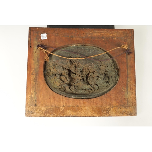 701 - AFTER JUSTIN MATHIEU. A 19TH CENTURY BRONZE OVAL PLAQUE MODELLED IN HIGH RELIEF DEPICTING A MEDIEVAL... 