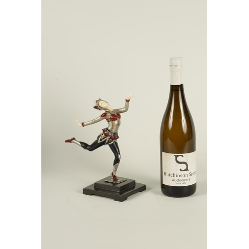 704 - AN ART DECO COLD PAINTED BRONZE AND IVORY FIGURE OF A FEMALE JESTER dancing and mounted on a stepped... 