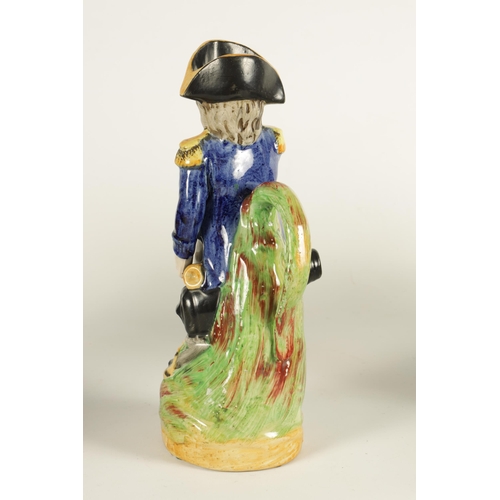 71 - A 19TH CENTURY POLYCHROME FIGURAL TOBY JUG DEPICTING ADMIRAL LORD NELSON (29cm high )