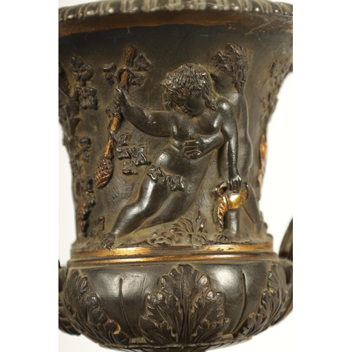 712 - A PAIR OF 19TH CENTURY FRENCH BRONZE AND ORMOLU URNS of classical campana form with gadrooned rims a... 