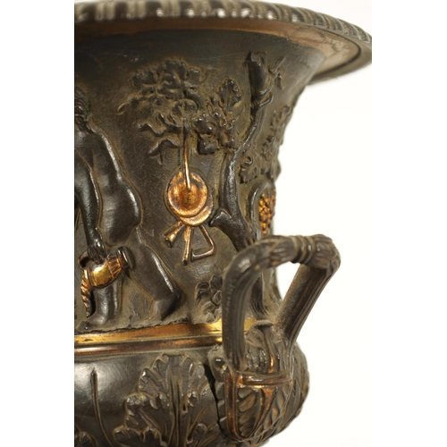 712 - A PAIR OF 19TH CENTURY FRENCH BRONZE AND ORMOLU URNS of classical campana form with gadrooned rims a... 