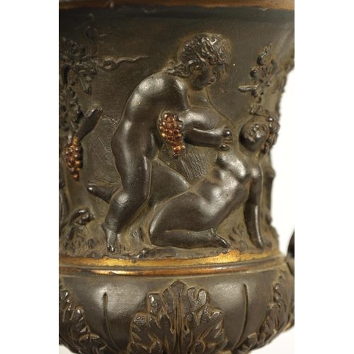 712 - A PAIR OF 19TH CENTURY FRENCH BRONZE AND ORMOLU URNS of classical campana form with gadrooned rims a... 