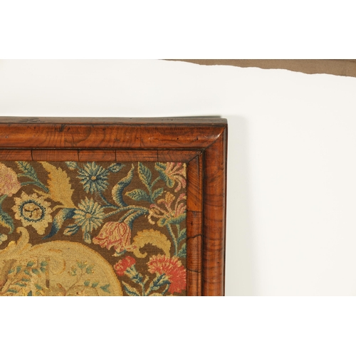 714 - A GEORGE II NEEDLEWORK TAPESTRY IN ORIGINAL FIGURED WALNUT SHORT GRAIN MOULDED FRAME depiciting clas... 