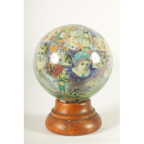 717 - A RARE 19TH CENTURY DECALCOMANIA GLASS GLOBE internally decorated with portraits, mask heads and dom... 