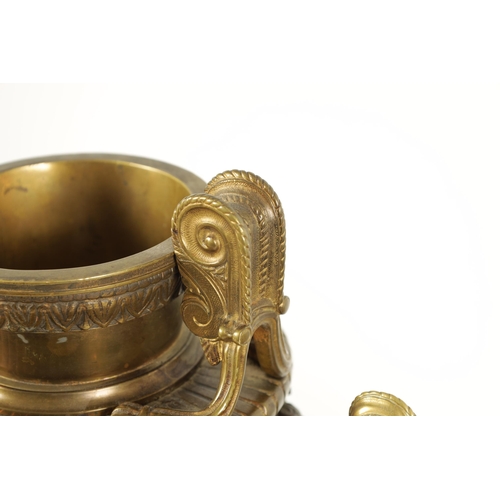 719 - TWO 19TH CENTURY FRENCH BRASS AND COPPER ROMANESQUE TWO-HANDLED URNS with figural centre bands (29cm... 