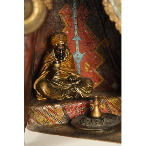 722 - AN EARLY 20TH CENTURY BERGMAN COLD-PAINTED BRONZE ORIENTALIST TABLE LAMP depicting an Arabian gentle... 