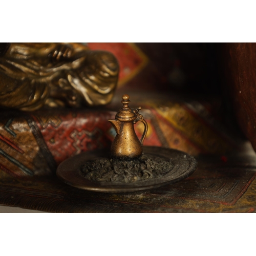 722 - AN EARLY 20TH CENTURY BERGMAN COLD-PAINTED BRONZE ORIENTALIST TABLE LAMP depicting an Arabian gentle... 