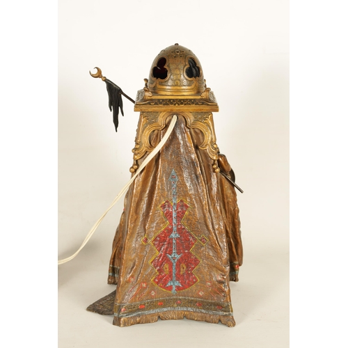 722 - AN EARLY 20TH CENTURY BERGMAN COLD-PAINTED BRONZE ORIENTALIST TABLE LAMP depicting an Arabian gentle... 