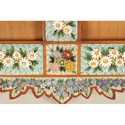 723 - A 19TH CENTURY ITALIAN MICRO-MOSAIC DOUBLE PICTURE FRAME with shaped surround decorated with flower ... 