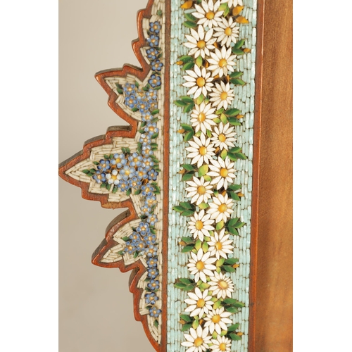 723 - A 19TH CENTURY ITALIAN MICRO-MOSAIC DOUBLE PICTURE FRAME with shaped surround decorated with flower ... 