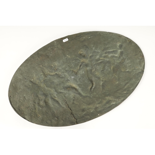 724 - A 19TH CENTURY FRENCH PATINATED BRONZE OVAL PLAQUE OF LARGE SIZE depicting cherubs in a dancing purs... 