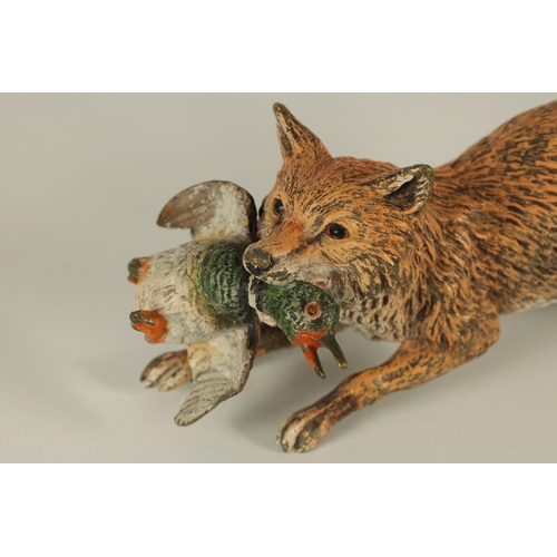 730 - AN EARLY 20TH CENTURY AUSTRIAN COLD PAINTED BRONZE SCULPTURE OF A FOX CARRYING A DUCK featured on pa... 