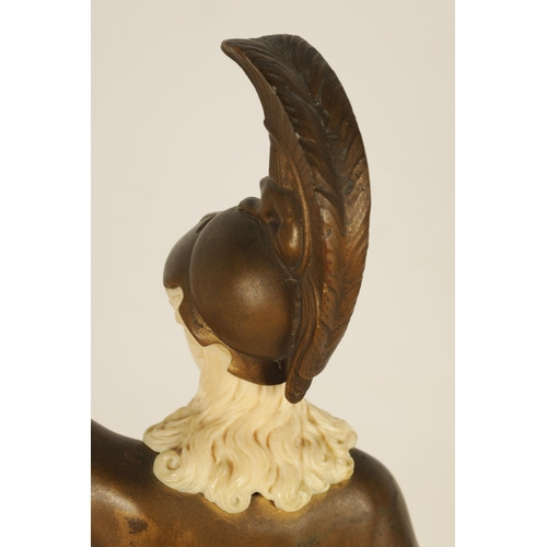 732 - GOTTHILF JAEGER. AN ART DECO GERMAN BRONZE AND IVORY FIGURE modelled as a young woman wearing Trojan... 