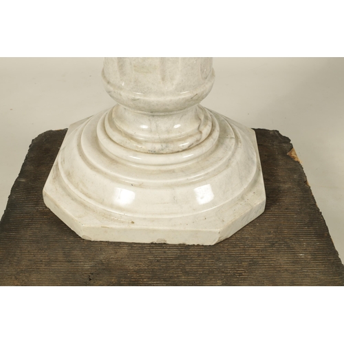 733 - AN EARLY 20TH CENTURY VEINED MARBLE REEDED COLUMN PEDESTAL on moulded base with canted cornered squa... 