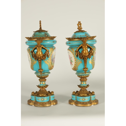 74 - A PAIR OF 19TH CENTURY FRENCH SEVRES STYLE ORMOLU MOUNTED VASES AND COVERS the slightly tapered jewe... 