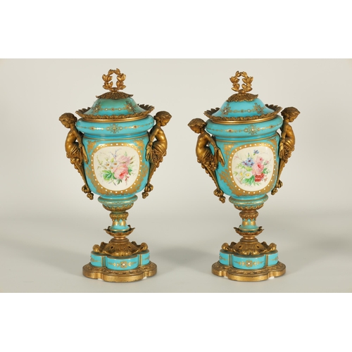 74 - A PAIR OF 19TH CENTURY FRENCH SEVRES STYLE ORMOLU MOUNTED VASES AND COVERS the slightly tapered jewe... 