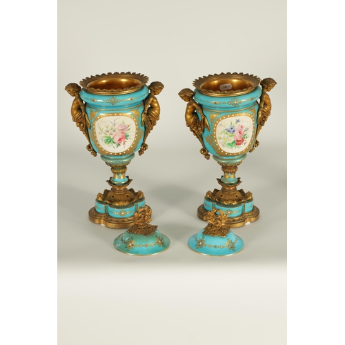 74 - A PAIR OF 19TH CENTURY FRENCH SEVRES STYLE ORMOLU MOUNTED VASES AND COVERS the slightly tapered jewe... 