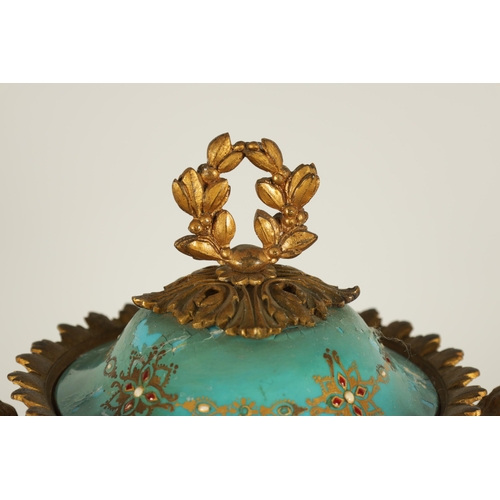 74 - A PAIR OF 19TH CENTURY FRENCH SEVRES STYLE ORMOLU MOUNTED VASES AND COVERS the slightly tapered jewe... 