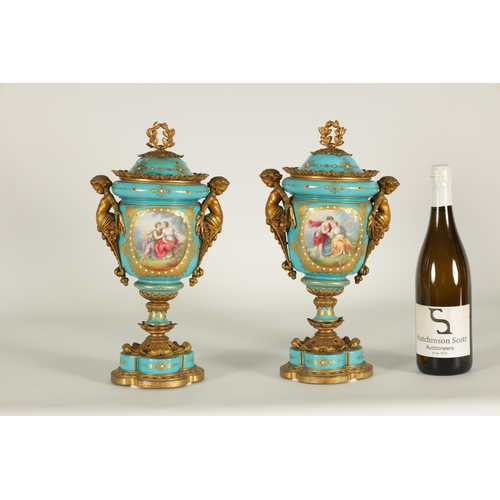 74 - A PAIR OF 19TH CENTURY FRENCH SEVRES STYLE ORMOLU MOUNTED VASES AND COVERS the slightly tapered jewe... 