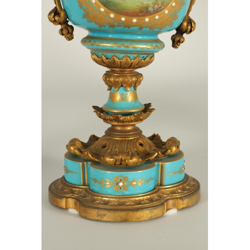 74 - A PAIR OF 19TH CENTURY FRENCH SEVRES STYLE ORMOLU MOUNTED VASES AND COVERS the slightly tapered jewe... 