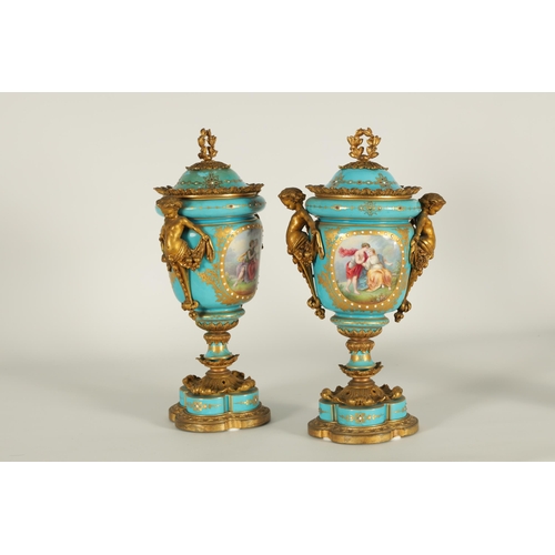 74 - A PAIR OF 19TH CENTURY FRENCH SEVRES STYLE ORMOLU MOUNTED VASES AND COVERS the slightly tapered jewe... 