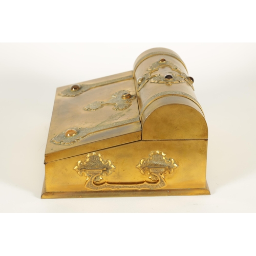 740 - A 19TH CENTURY GILT BRONZE WRITING SLOPE decorated with Tiger's Eye cabochons and embossed strap wor... 