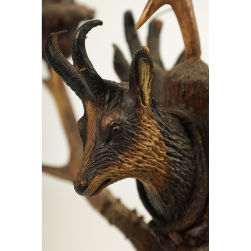 743 - AN UNUSUAL PAIR OF 19TH CENTURY BLACK FOREST POLYCHROME CARVED WOOD, ANTLER HORN AND BOAR'S TUSK FIV... 