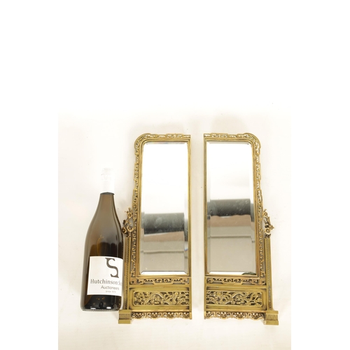 745 - A DECORATIVE PAIR OF LATE 19TH CENTURY GILT BRONZE FRENCH JAPANESE STYLE MIRRORS of rectangular form... 