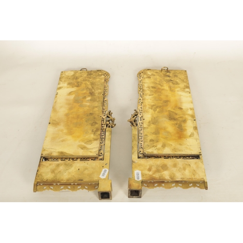 745 - A DECORATIVE PAIR OF LATE 19TH CENTURY GILT BRONZE FRENCH JAPANESE STYLE MIRRORS of rectangular form... 