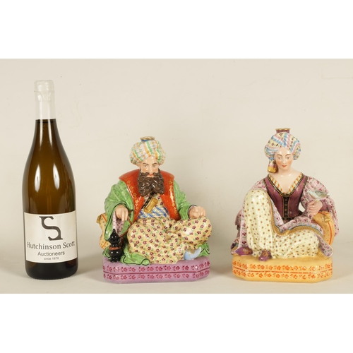 76 - A PAIR OF 19TH CENTURY FRENCH FIGURAL PORCELAIN PERFUME BOTTLES BY JACOB PETIT colourfully painted a... 