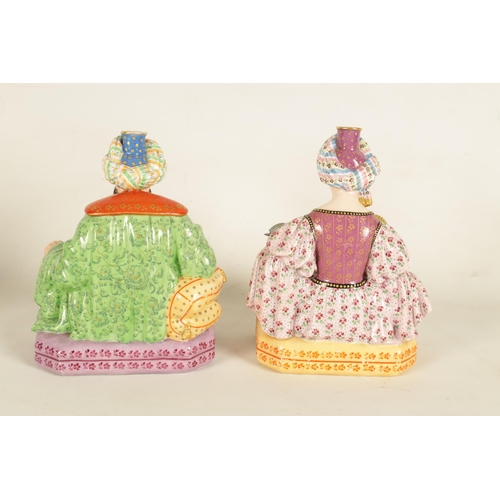 76 - A PAIR OF 19TH CENTURY FRENCH FIGURAL PORCELAIN PERFUME BOTTLES BY JACOB PETIT colourfully painted a... 