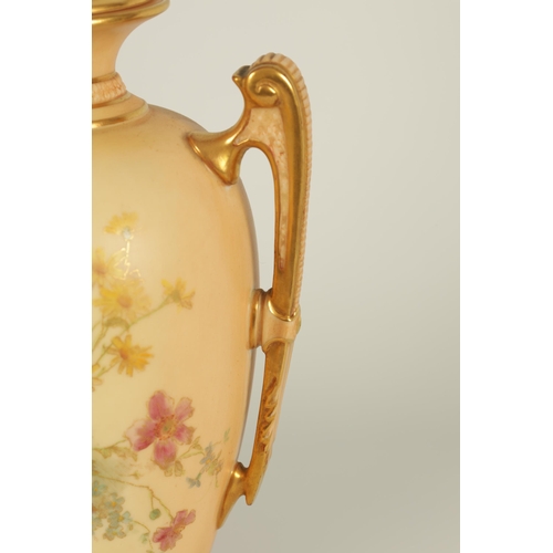 77 - AN ORNATE ROYAL WORCESTER GILT AND IVORY GROUND SCROLLED TWO-HANDLED CABINET VASE AND COVER of bulbo... 