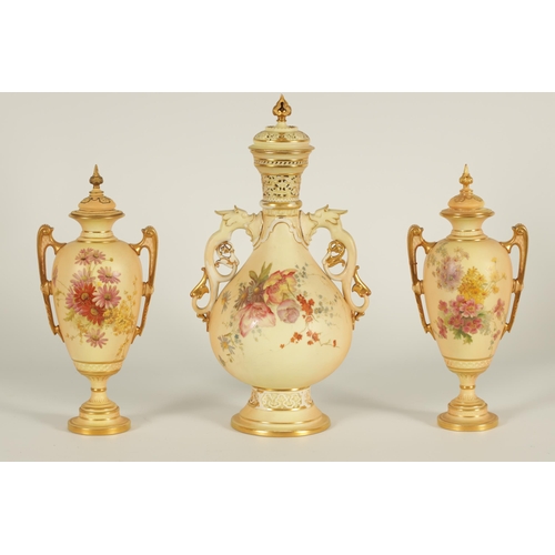 77 - AN ORNATE ROYAL WORCESTER GILT AND IVORY GROUND SCROLLED TWO-HANDLED CABINET VASE AND COVER of bulbo... 