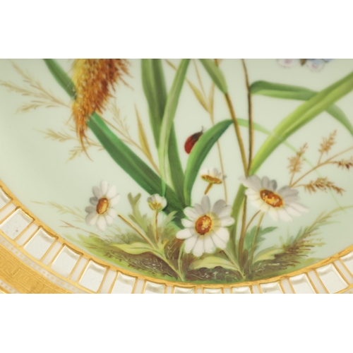 78 - A PAIR OF LATE 19TH CENTURY MINTON CABINET PLATES with pierced raised gilt borders and painted scene... 