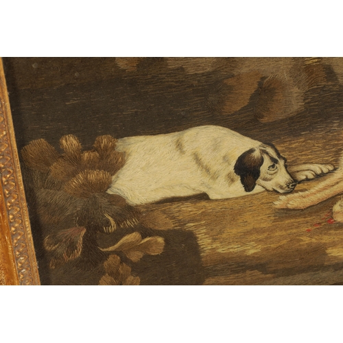 836 - A 19TH CENTURY HUNTING TAPESTRY PICTURE depicting a dog sat with shot gun and dead game - mounted an... 