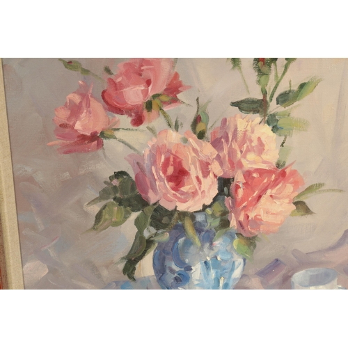 847 - HELEN TURNER (BORN 1937) A 20TH CENTURY OIL ON CANVAS STILL LIFE a vase of pink roses - signed, glaz... 