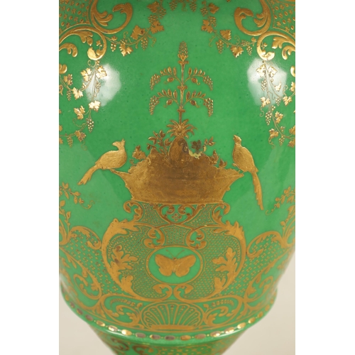 85 - A FINE 19TH CENTURY PARIS PORCELAIN GREEN AND GILT PEDESTAL VASE OF LARGE SIZE the panelled fronts w... 