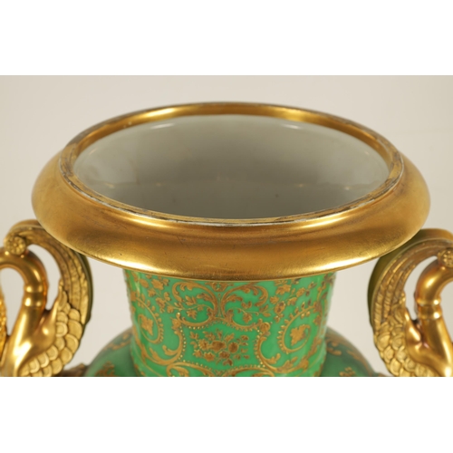 85 - A FINE 19TH CENTURY PARIS PORCELAIN GREEN AND GILT PEDESTAL VASE OF LARGE SIZE the panelled fronts w... 