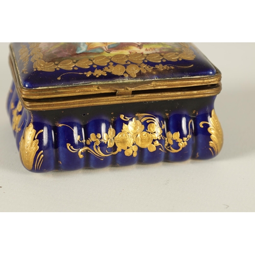 88 - AN 18TH CENTURY SEVRES STYLE PORCELAIN BOX with painted romantic figural country scene to the hinged... 