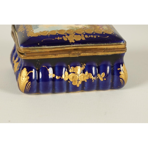 88 - AN 18TH CENTURY SEVRES STYLE PORCELAIN BOX with painted romantic figural country scene to the hinged... 