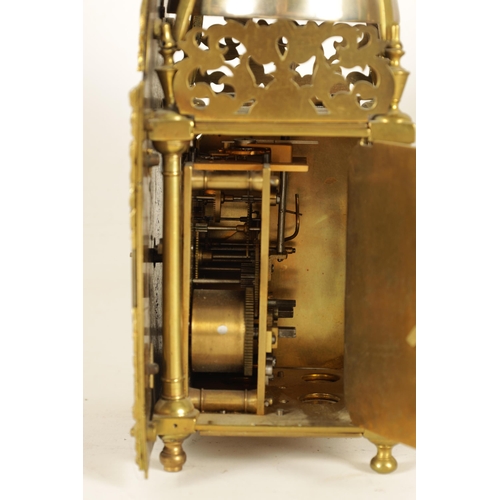 899 - AN 18TH CENTURY BRASS LANTERN CLOCK WITH LATER MOVEMENT the 12cm arched dial signed Chalklen, Canter... 