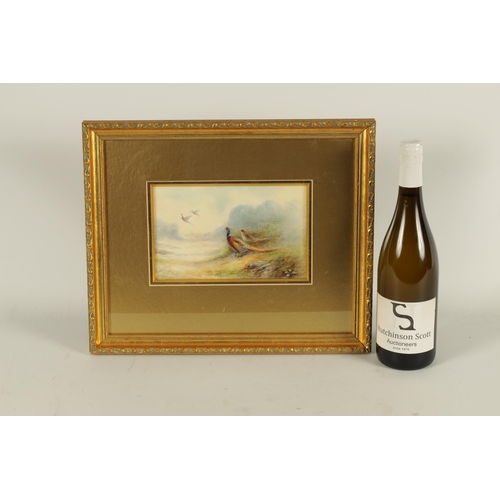 90 - JAMES STINTON. A ROYAL WORCESTER FRAMED RECTANGULAR PORCELAIN PLAQUE painted with a pair of pheasant... 