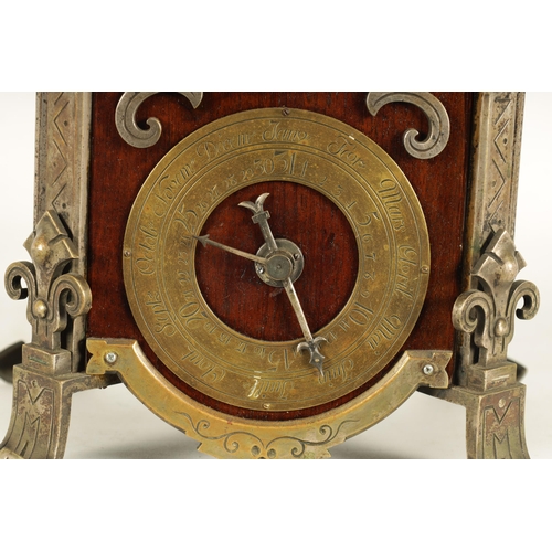 901 - AN UNUSUAL FRENCH ARTS AND CRAFTS MANTEL CLOCK WITH AXE MOON AND CALENDAR DIAL the 4.5