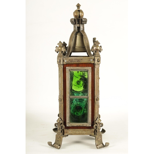 901 - AN UNUSUAL FRENCH ARTS AND CRAFTS MANTEL CLOCK WITH AXE MOON AND CALENDAR DIAL the 4.5