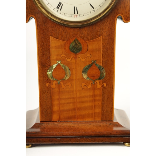 914 - AN EDWARDIAN ART NOUVEAU STYLE BOXWOOD STRUNG AND MAHOGANY INLAID MANTEL CLOCK the enamel Roman dial... 